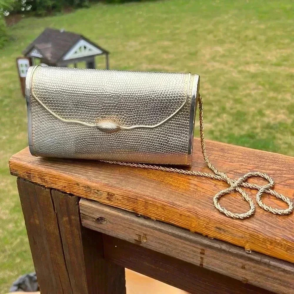 Morris Moscowitz snake embossed metal evening bag